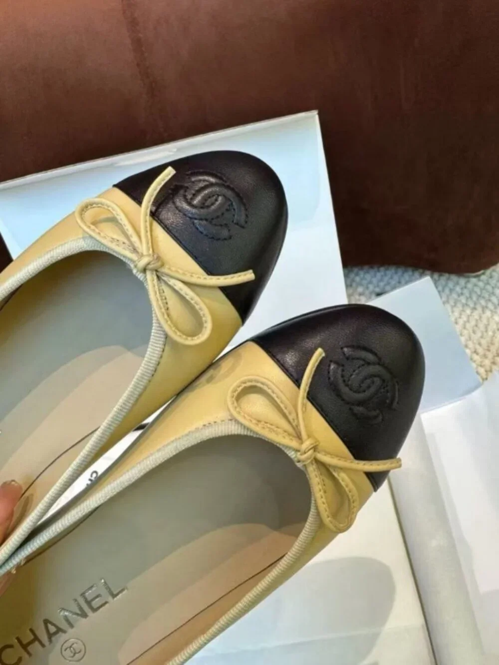 CHANEL Two-Tone Leather Embossed CC Bow Round Toe Ballet Flats